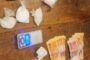 Members of Border police remove drugs during a follow-up visit at a drug house