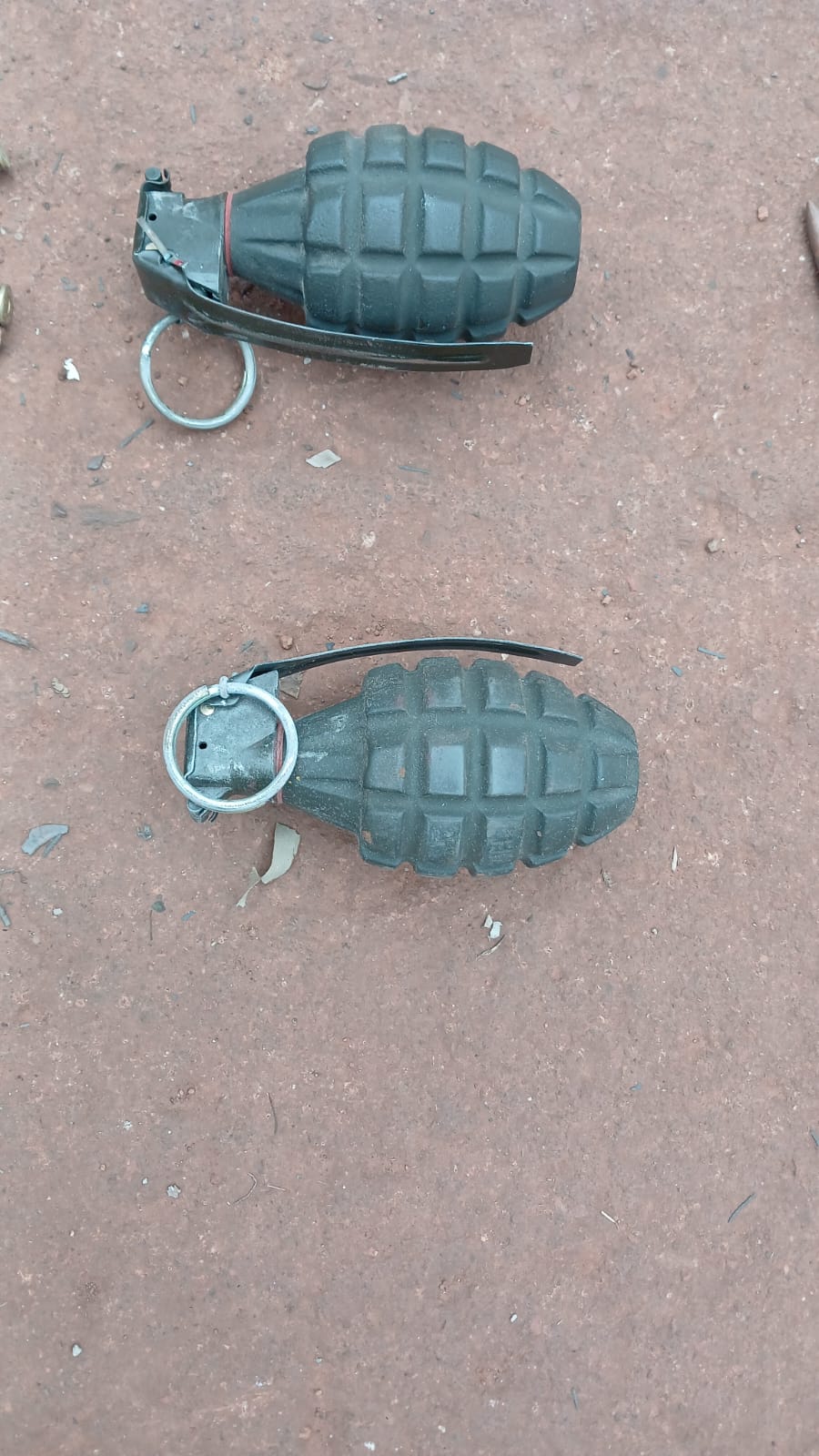 Police seize two hand grenades during Operation Vala Umgodi as illegal miners fled from SAPS members