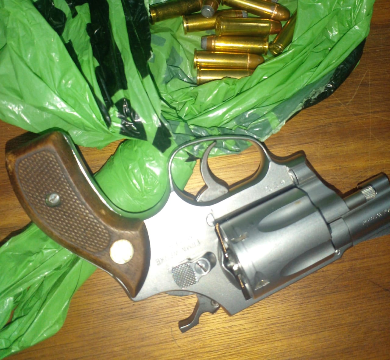 Two suspects arrested on charges of possession of an unlicensed firearm and unlawful possession of ammunition in Hillcrest