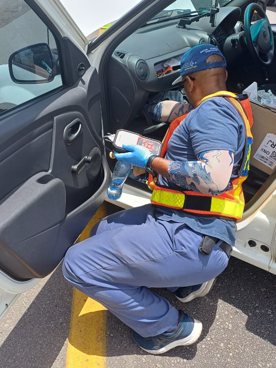 Members of the SAPS Vehicle Crime Investigation Unit conducting a vehicle checkpoint in the North West Province