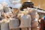 Police arrest woman for illicit processing of suspected precious minerals