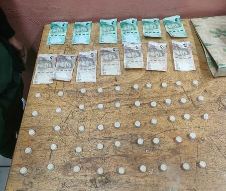 Male suspect found dealing in substances suspected to be drugs
