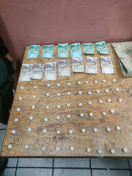 Male suspect found dealing in substances suspected to be drugs