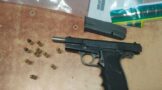 Public Order Police detain a suspect for discharging a firearm in a residential area