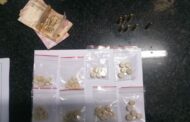 Police arrest a suspect for possession of drugs and ammunition