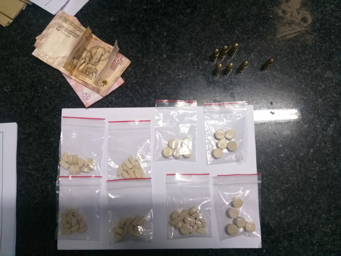 Police arrest a suspect for possession of drugs and ammunition