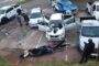Four taxi drivers have been arrested after violently removing a family of three from their vehicle and taking possession of it