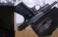 Murder suspect also charged for possession of unlicensed firearm