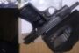 Murder suspect also charged for possession of unlicensed firearm