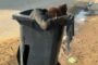Suspect arrested after he was caught transporting an injured man inside a wheelie bin
