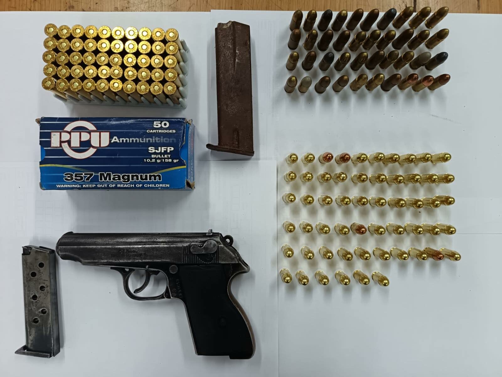 A 57-year-old suspect was arrested for possession of an unlicensed firearm and illegal possession of ammunition