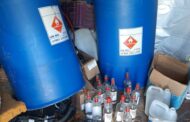 Suspect caught mixing ethanol with water