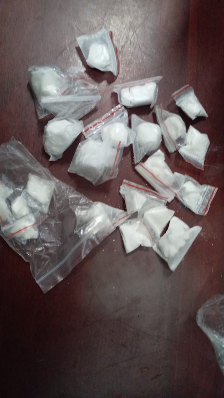 Nigerian male arrested for possession of approximately 100 grams of cocaine
