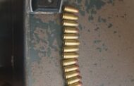 Suspects arrested on charges of possession of an unlicensed firearm and ammunition