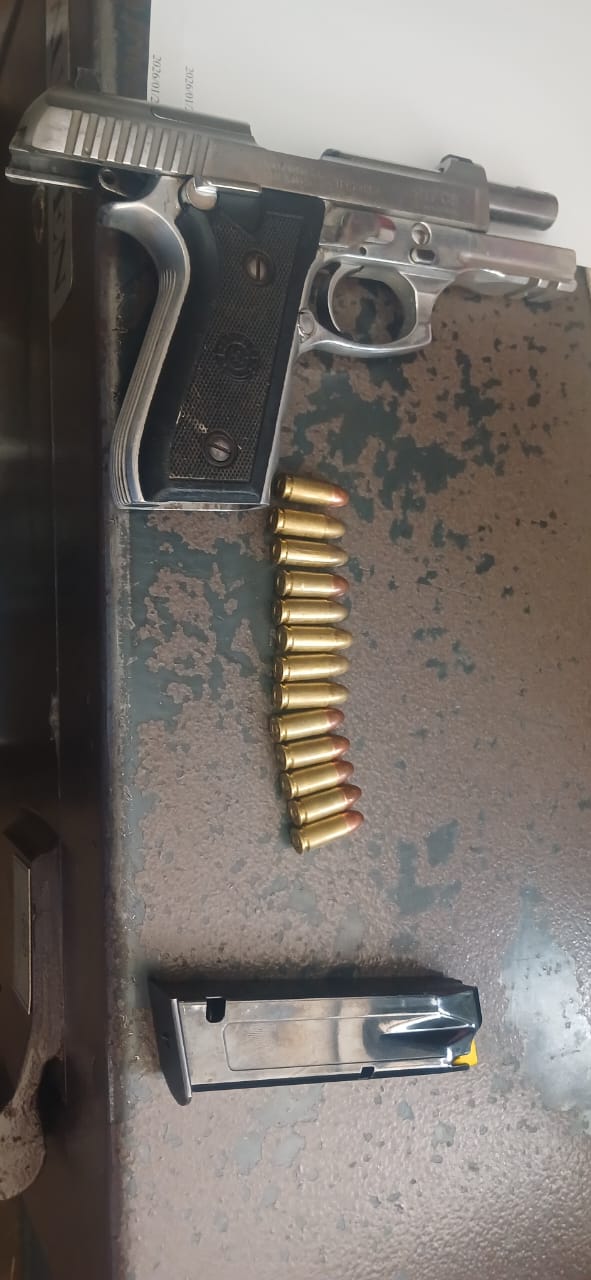 Suspects arrested on charges of possession of an unlicensed firearm and ammunition