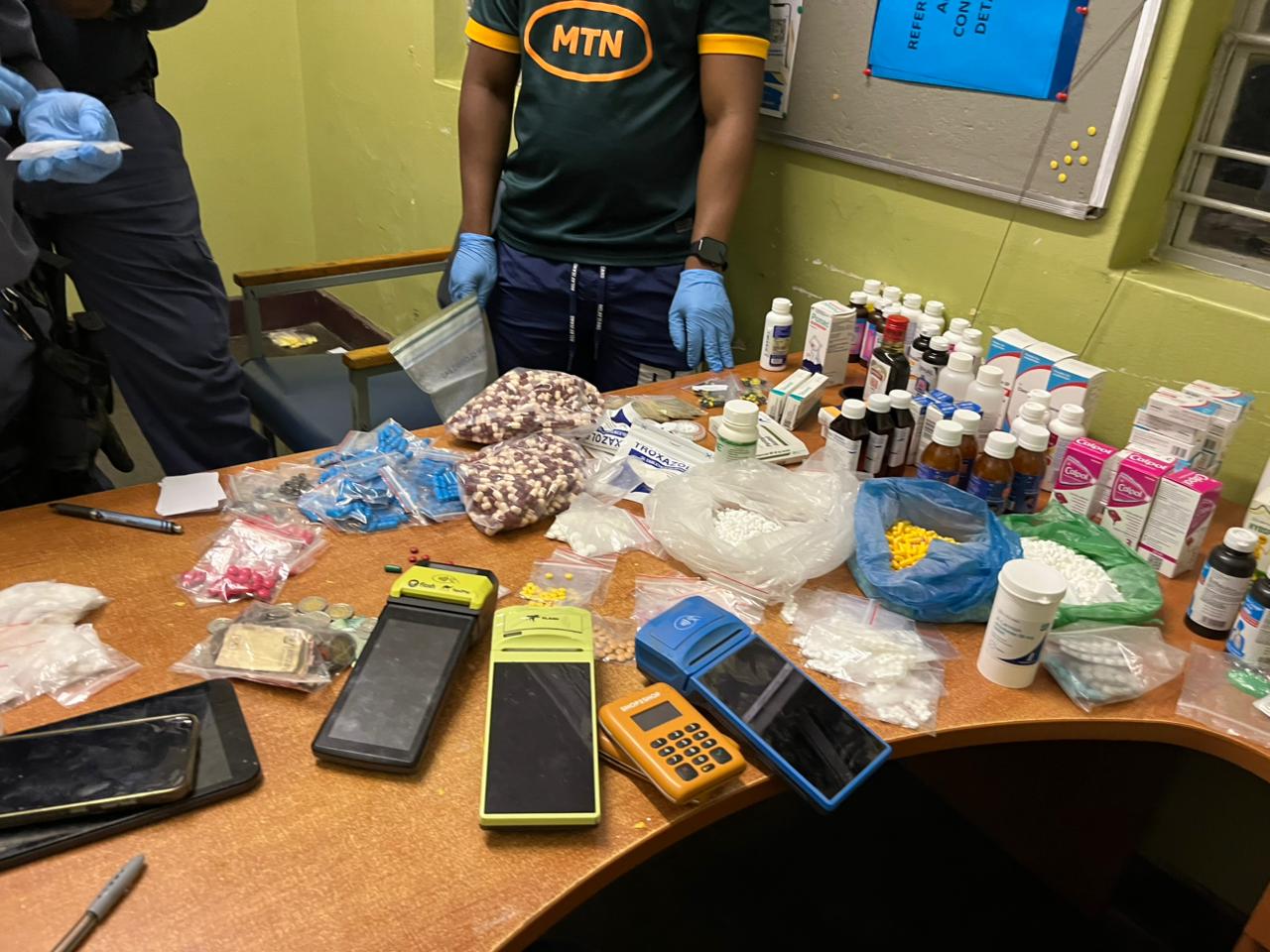 Female suspect arrested for operating an unlicensed pharmacy and medical practice from a residential premises in Duncan Village